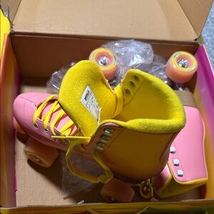 Vibrant Pink and Yellow Kids Roller Skates